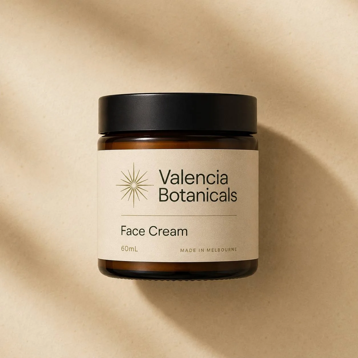 Valencia Botanicals Face Cream — small amber glass jar with cork lid, 60mL